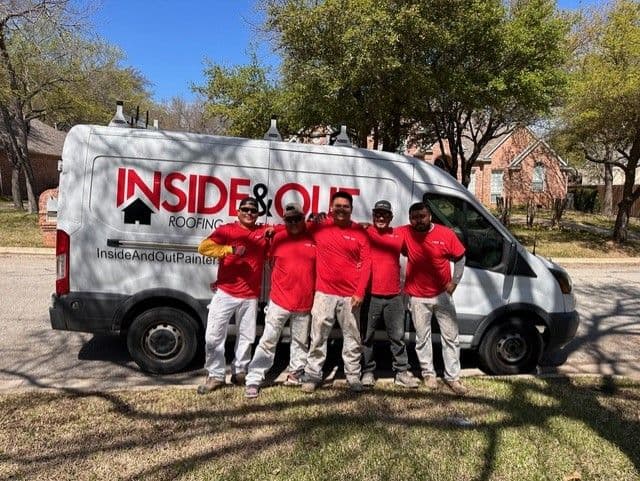 Team in front of van